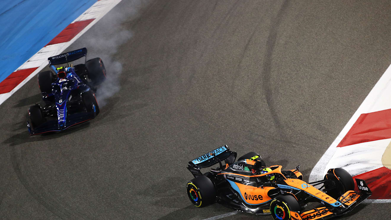 BAHRAIN, BAHRAIN - MARCH 20: Lando Norris of Great Britain driving the (4) McLaren MCL36 Mercedes leads Nicholas Latifi driving the (6) Williams FW44 Mercedes during the F1 Grand Prix of Bahrain at Bahrain International Circuit on March 20, 2022 in Bahrain, Bahrain. (Photo by Joe Portlock - Formula 1/Formula 1 via Getty Images)