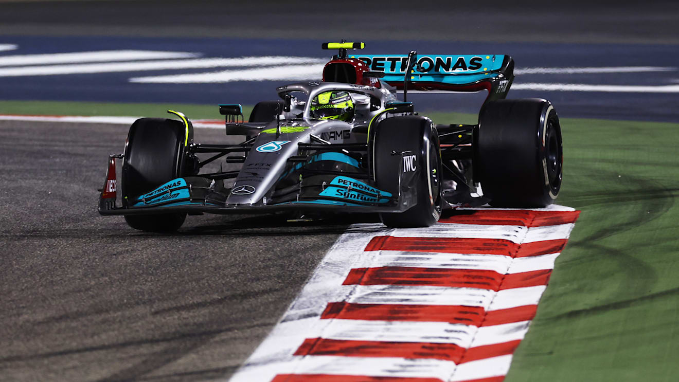 BAHRAIN, BAHRAIN - MARCH 20: Lewis Hamilton of Great Britain driving the (44) Mercedes AMG Petronas F1 Team W13 slides round a corner during the F1 Grand Prix of Bahrain at Bahrain International Circuit on March 20, 2022 in Bahrain, Bahrain. (Photo by Lars Baron/Getty Images)