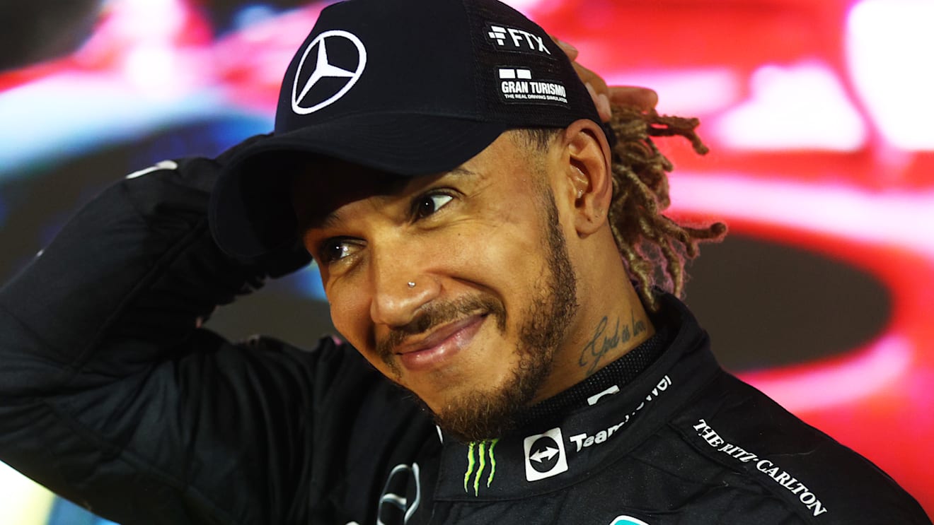 BAHRAIN, BAHRAIN - MARCH 20: Third placed Lewis Hamilton of Great Britain and Mercedes looks on in parc ferme during the F1 Grand Prix of Bahrain at Bahrain International Circuit on March 20, 2022 in Bahrain, Bahrain. (Photo by Clive Rose - Formula 1/Formula 1 via Getty Images)