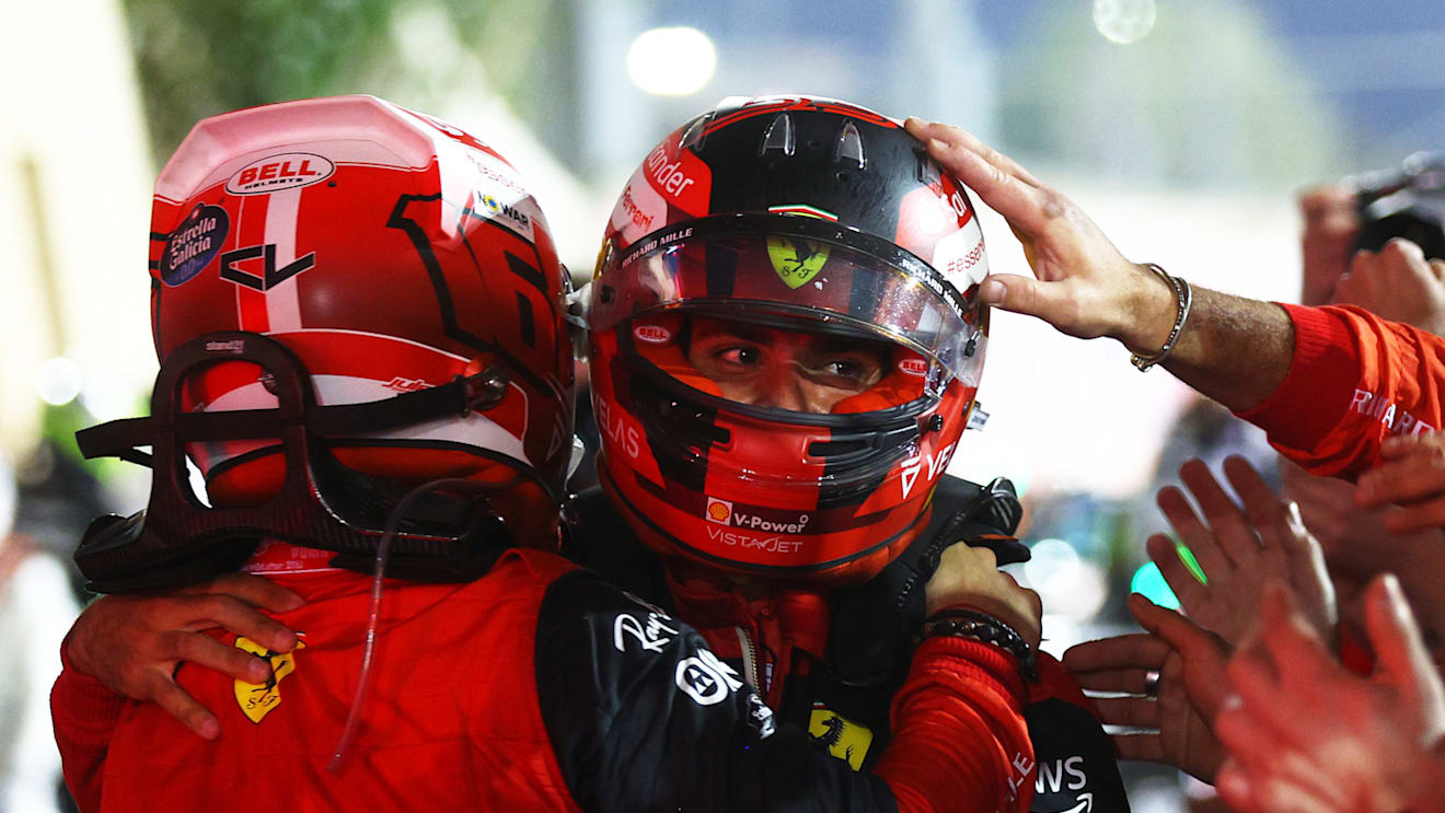 BAHRAIN, BAHRAIN - MARCH 20: Race winner Charles Leclerc of Monaco and Ferrari and Second placed Carlos Sainz of Spain and Ferrari celebrate in parc ferme during the F1 Grand Prix of Bahrain at Bahrain International Circuit on March 20, 2022 in Bahrain, Bahrain. (Photo by Clive Rose - Formula 1/Formula 1 via Getty Images)