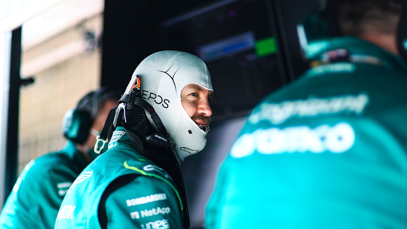 BAHRAIN, BAHRAIN - MARCH 11: Sebastian Vettel of Germany and Aston Martin F1 Team looks on from the pitwall during Day Two of F1 Testing at Bahrain International Circuit on March 11, 2022 in Bahrain, Bahrain. (Photo by Dan Istitene - Formula 1/Formula 1 via Getty Images)