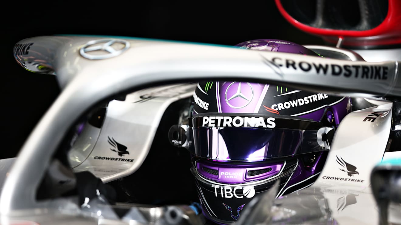 BAHRAIN, BAHRAIN - MARCH 11: Lewis Hamilton of Great Britain and Mercedes prepares to drive in the garage during Day Two of F1 Testing at Bahrain International Circuit on March 11, 2022 in Bahrain, Bahrain. (Photo by Lars Baron/Getty Images)