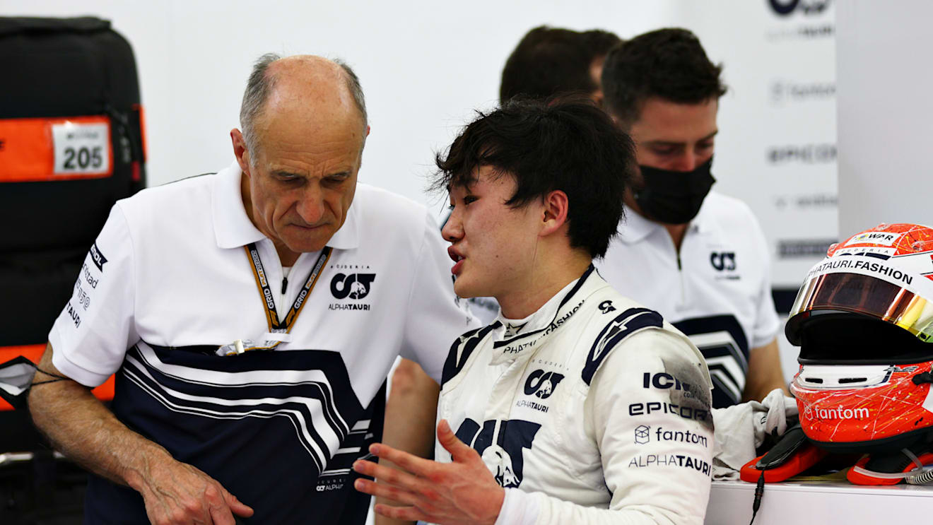 BAHRAIN, BAHRAIN - MARCH 11: Yuki Tsunoda of Japan and Scuderia AlphaTauri talks to Scuderia AlphaTauri Team Principal Franz Tost in the garage during Day Two of F1 Testing at Bahrain International Circuit on March 11, 2022 in Bahrain, Bahrain. (Photo by Lars Baron/Getty Images)