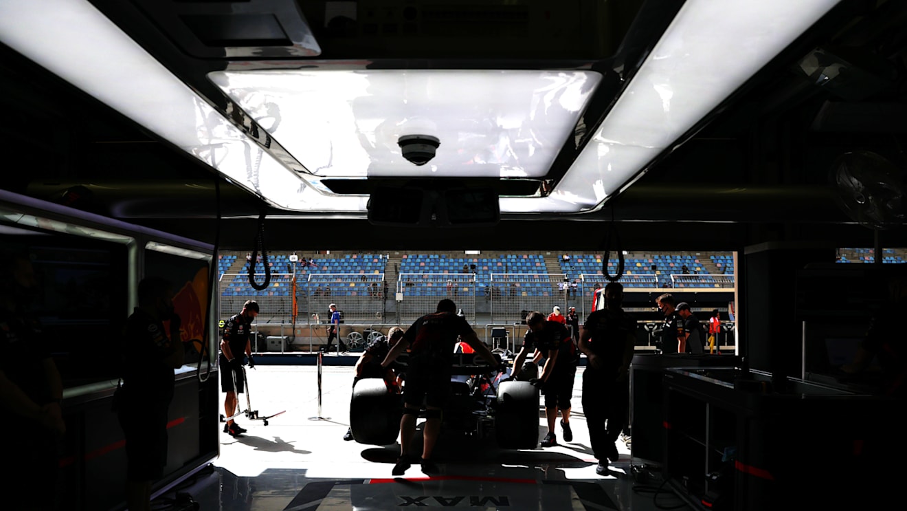 BAHRAIN, BAHRAIN - MARCH 12: Sergio Perez of Mexico driving the (11) Oracle Red Bull Racing RB18 is pulled back into the garage during Day Three of F1 Testing at Bahrain International Circuit on March 12, 2022 in Bahrain, Bahrain. (Photo by Mark Thompson/Getty Images)