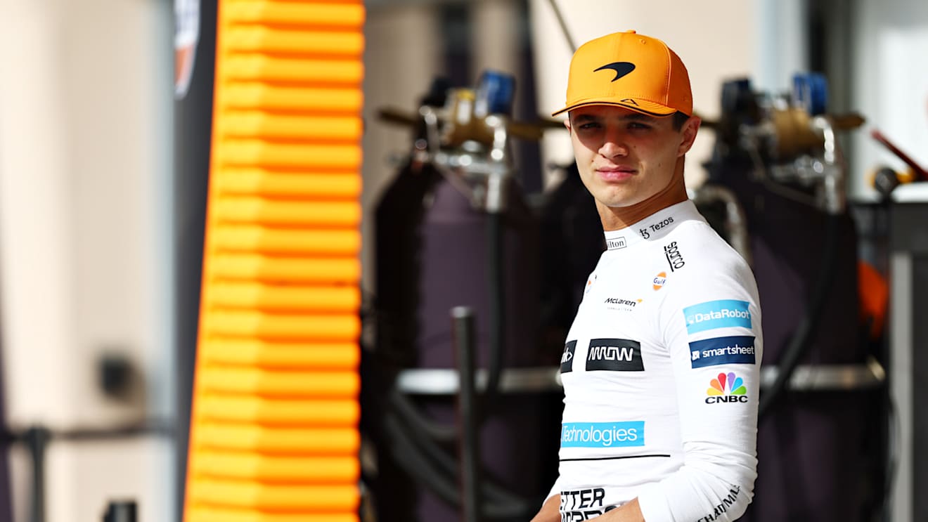 BAHRAIN, BAHRAIN - MARCH 12: Lando Norris of Great Britain and McLaren looks on in the Pitlane during Day Three of F1 Testing at Bahrain International Circuit on March 12, 2022 in Bahrain, Bahrain. (Photo by Lars Baron/Getty Images)