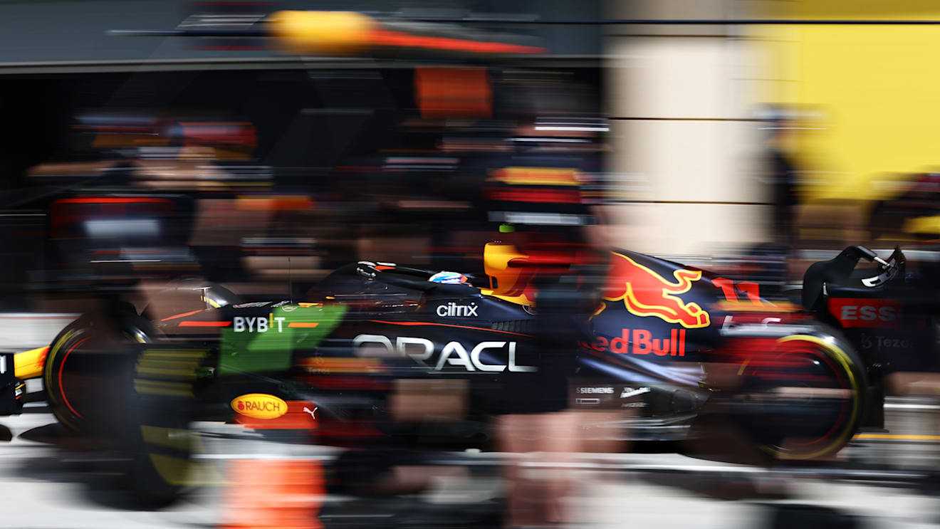 BAHRAIN, BAHRAIN - MARCH 12: Sergio Perez of Mexico driving the (11) Oracle Red Bull Racing RB18 makes a pitstop during Day Three of F1 Testing at Bahrain International Circuit on March 12, 2022 in Bahrain, Bahrain. (Photo by Mark Thompson/Getty Images)