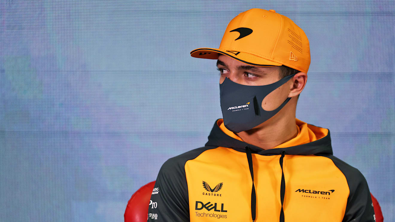 BARCELONA, SPAIN - FEBRUARY 25: Lando Norris of Great Britain and McLaren looks on in the Drivers Press Conference during Day Three of F1 Testing at Circuit de Barcelona-Catalunya on February 25, 2022 in Barcelona, Spain. (Photo by James Bearne - Pool/Getty Images)