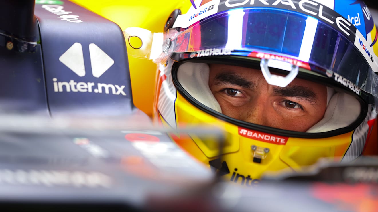 BARCELONA, SPAIN - FEBRUARY 25: Sergio Perez of Mexico and Oracle Red Bull Racing prepares to drive in the garage during Day Three of F1 Testing at Circuit de Barcelona-Catalunya on February 25, 2022 in Barcelona, Spain. (Photo by Mark Thompson/Getty Images)