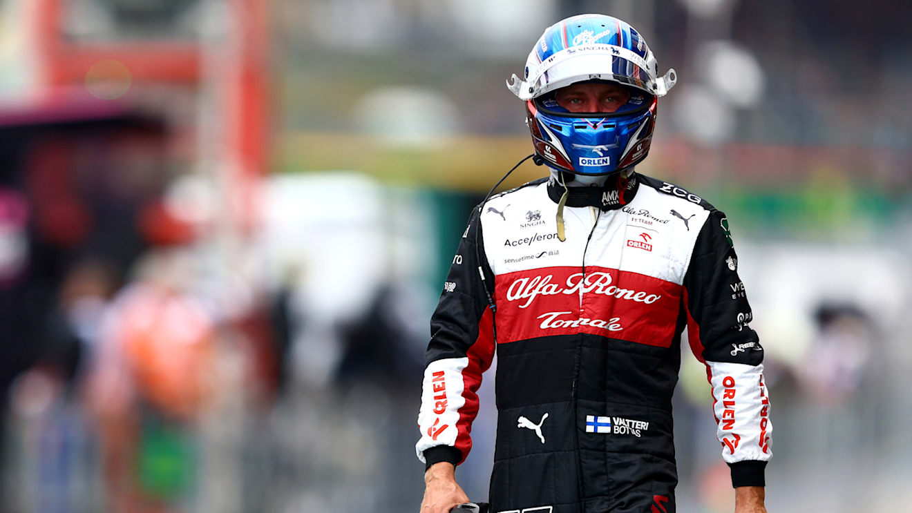 SPA, BELGIUM - AUGUST 27: 20th place qualifier Valtteri Bottas of Finland and Alfa Romeo F1 walks in the Pitlane during qualifying ahead of the F1 Grand Prix of Belgium at Circuit de Spa-Francorchamps on August 27, 2022 in Spa, Belgium. (Photo by Mark Thompson/Getty Images)