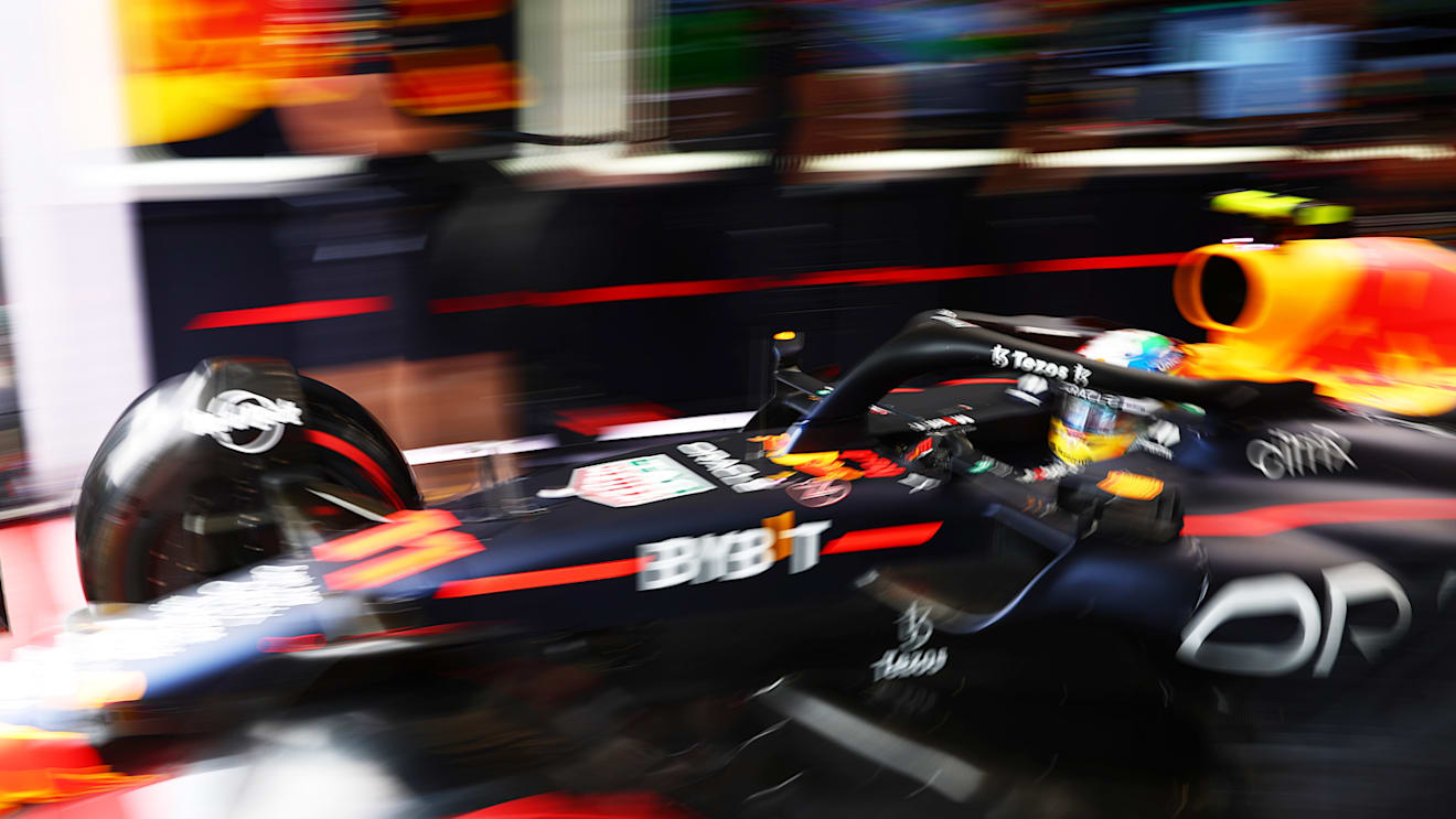 SPA, BELGIUM - AUGUST 27: Sergio Perez of Mexico driving the (11) Oracle Red Bull Racing RB18 leaves the garage during qualifying ahead of the F1 Grand Prix of Belgium at Circuit de Spa-Francorchamps on August 27, 2022 in Spa, Belgium. (Photo by Mark Thompson/Getty Images)