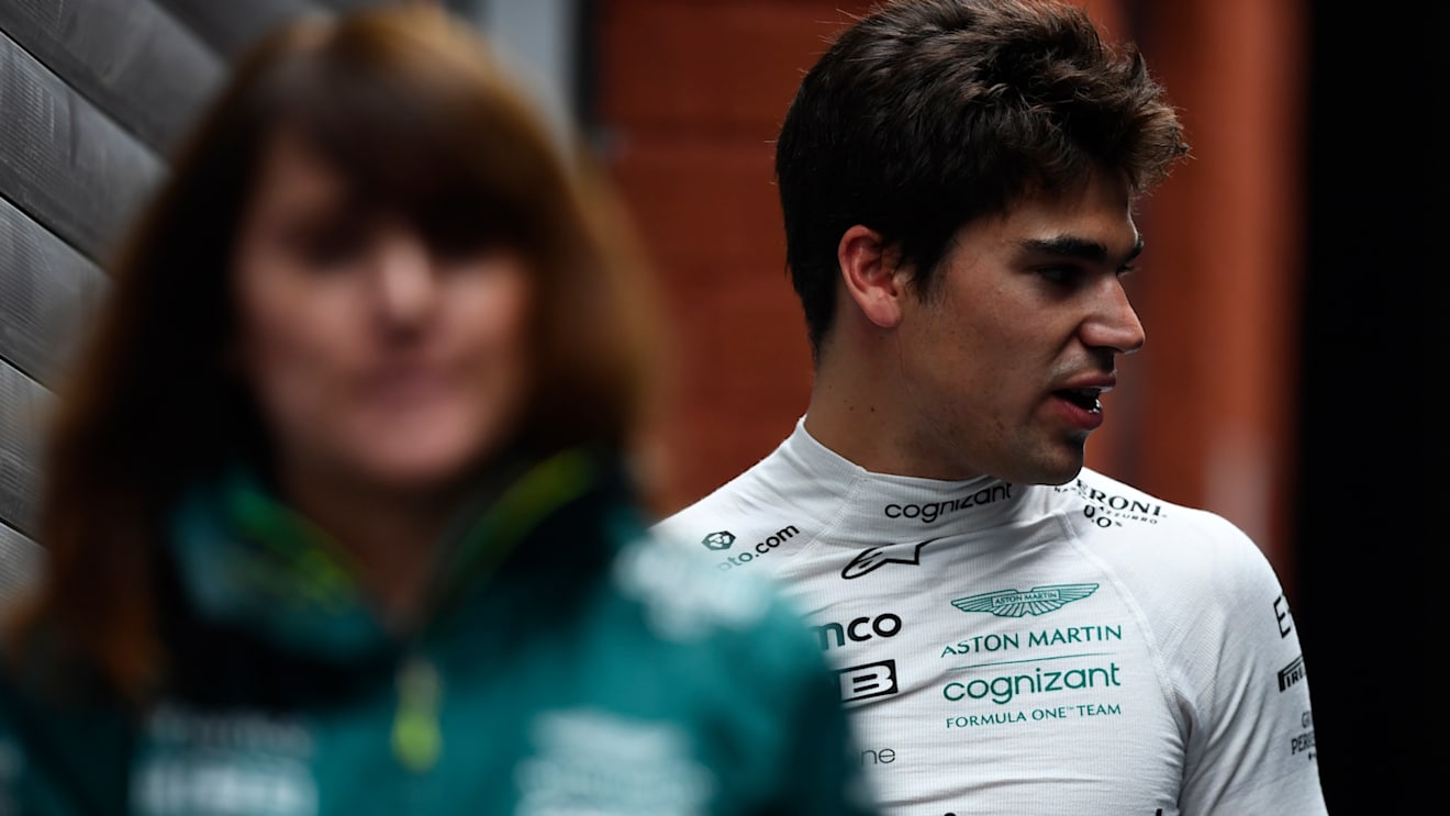 SPA, BELGIUM - AUGUST 27: 14th place qualifier Lance Stroll of Canada and Aston Martin F1 Team walks in the Paddock during qualifying ahead of the F1 Grand Prix of Belgium at Circuit de Spa-Francorchamps on August 27, 2022 in Spa, Belgium. (Photo by Rudy Carezzevoli/Getty Images)