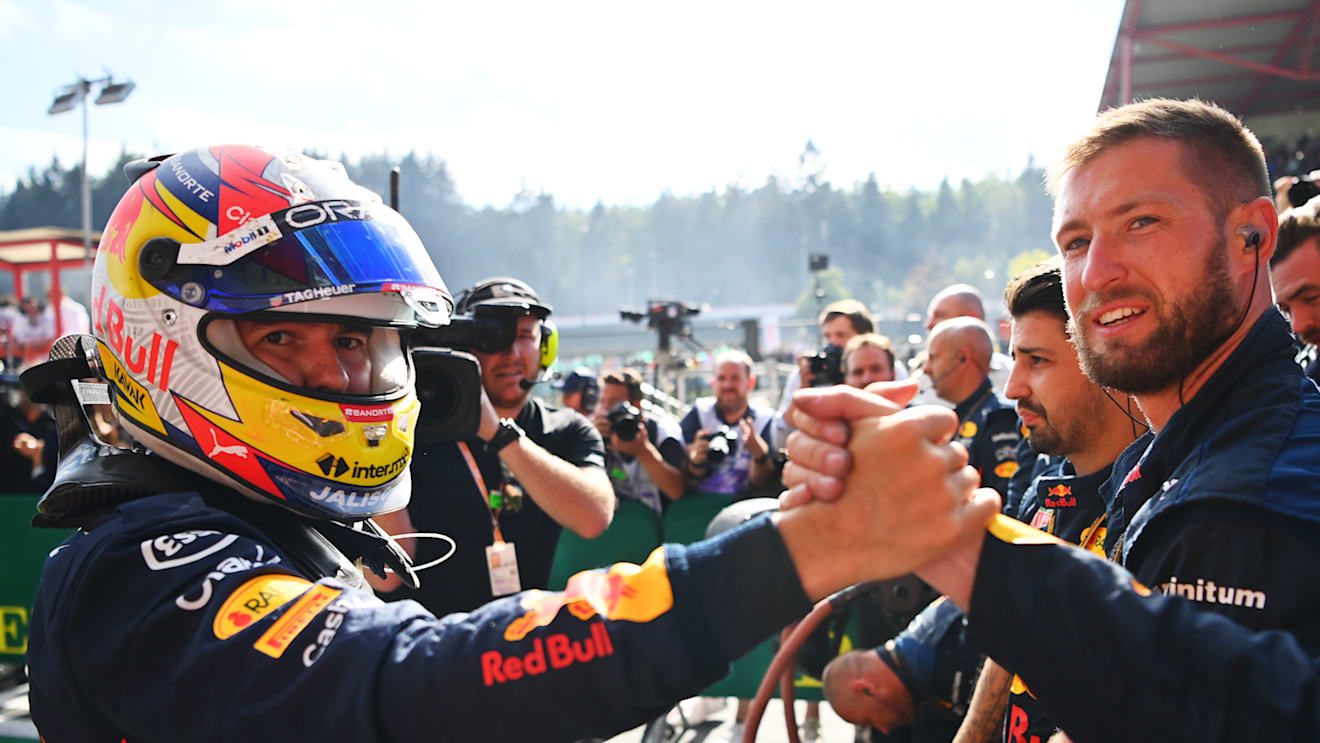 SPA, BELGIUM - AUGUST 28: Second placed Sergio Perez of Mexico and Oracle Red Bull Racing celebrates in parc ferme during the F1 Grand Prix of Belgium at Circuit de Spa-Francorchamps on August 28, 2022 in Spa, Belgium. (Photo by Dan Mullan/Getty Images)