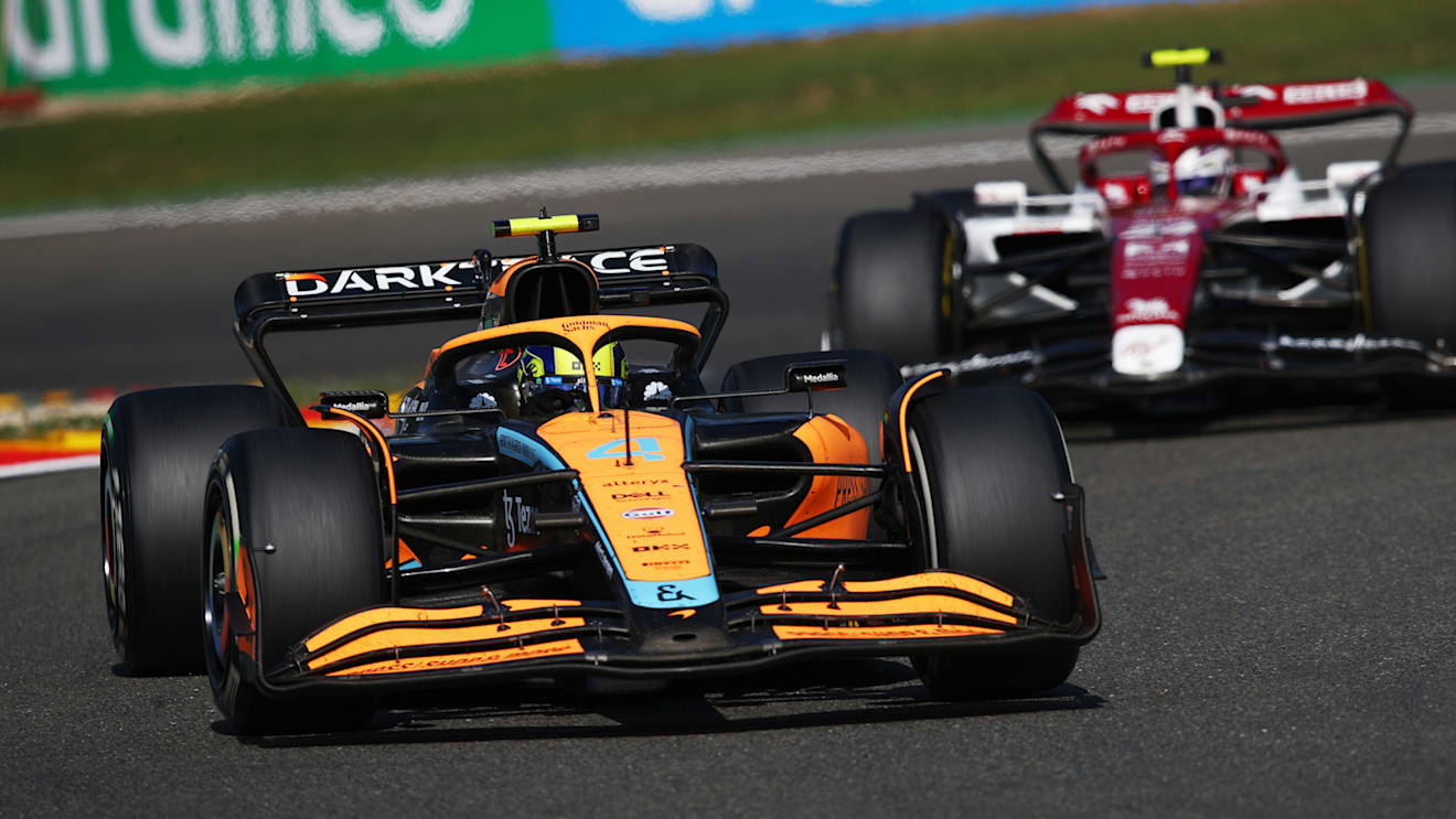 SPA, BELGIUM - AUGUST 28: Lando Norris of Great Britain driving the (4) McLaren MCL36 Mercedes leads Zhou Guanyu of China driving the (24) Alfa Romeo F1 C42 Ferrari during the F1 Grand Prix of Belgium at Circuit de Spa-Francorchamps on August 28, 2022 in Spa, Belgium. (Photo by Joe Portlock - Formula 1/Formula 1 via Getty Images)