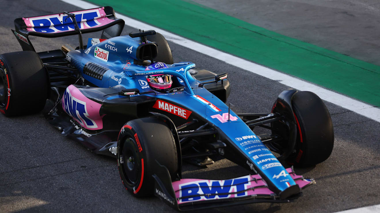 SAO PAULO, BRAZIL - NOVEMBER 12: Fernando Alonso of Spain driving the (14) Alpine F1 A522 Renault enters the pitlane with a broken front wing following a crash with Esteban Ocon of France and Alpine F1 during the Sprint ahead of the F1 Grand Prix of Brazil at Autodromo Jose Carlos Pace on November 12, 2022 in Sao Paulo, Brazil. (Photo by Dan Istitene - Formula 1/Formula 1 via Getty Images)