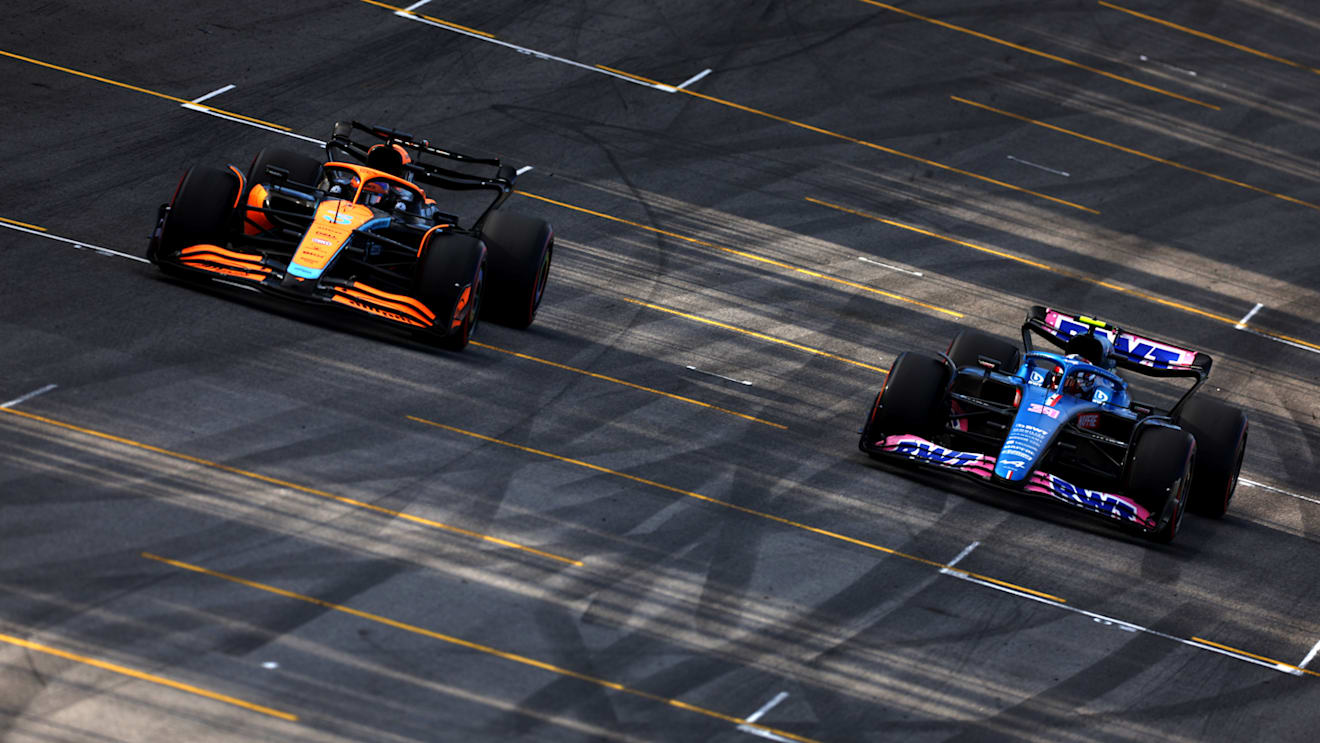 SAO PAULO, BRAZIL - NOVEMBER 12: Daniel Ricciardo of Australia driving the (3) McLaren MCL36 Mercedes and Esteban Ocon of France driving the (31) Alpine F1 A522 Renault on track during the Sprint ahead of the F1 Grand Prix of Brazil at Autodromo Jose Carlos Pace on November 12, 2022 in Sao Paulo, Brazil. (Photo by Dan Istitene - Formula 1/Formula 1 via Getty Images)