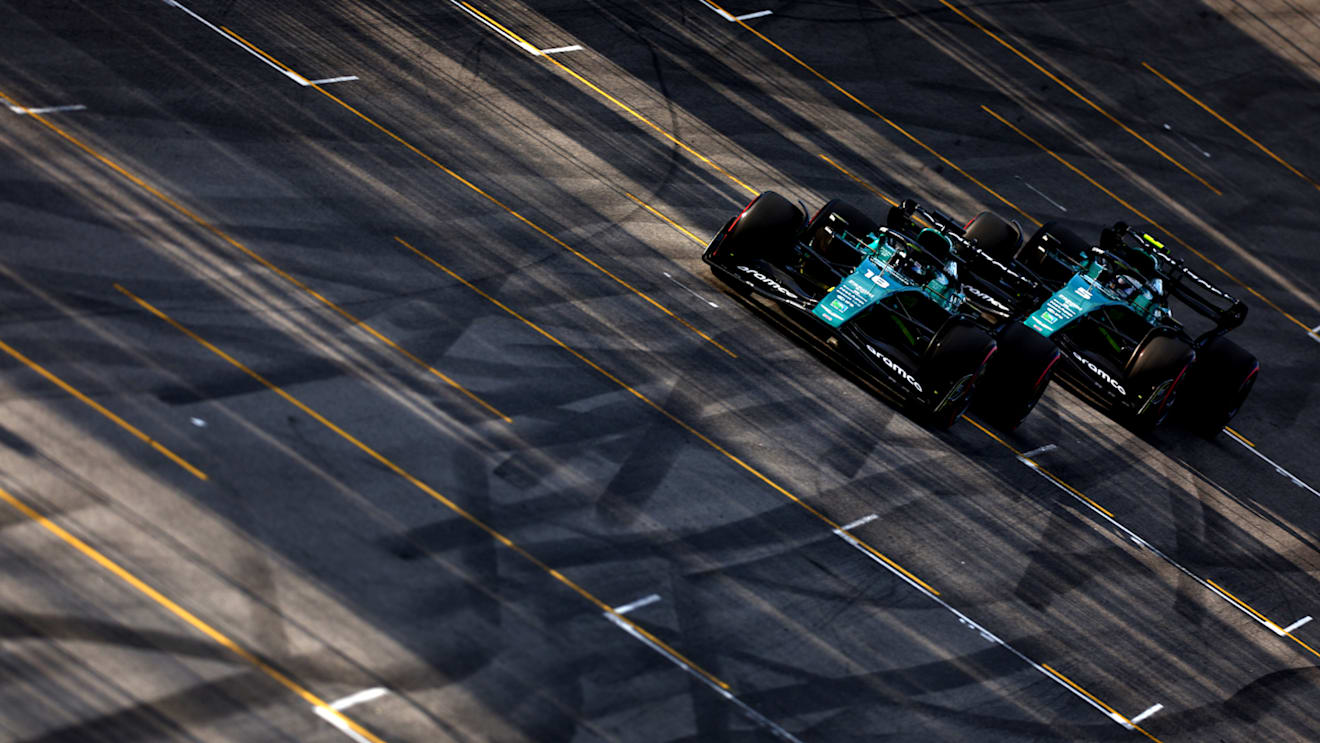 SAO PAULO, BRAZIL - NOVEMBER 12: Lance Stroll of Canada driving the (18) Aston Martin AMR22 Mercedes leads Sebastian Vettel of Germany driving the (5) Aston Martin AMR22 Mercedes on track during the Sprint ahead of the F1 Grand Prix of Brazil at Autodromo Jose Carlos Pace on November 12, 2022 in Sao Paulo, Brazil. (Photo by Dan Istitene - Formula 1/Formula 1 via Getty Images)