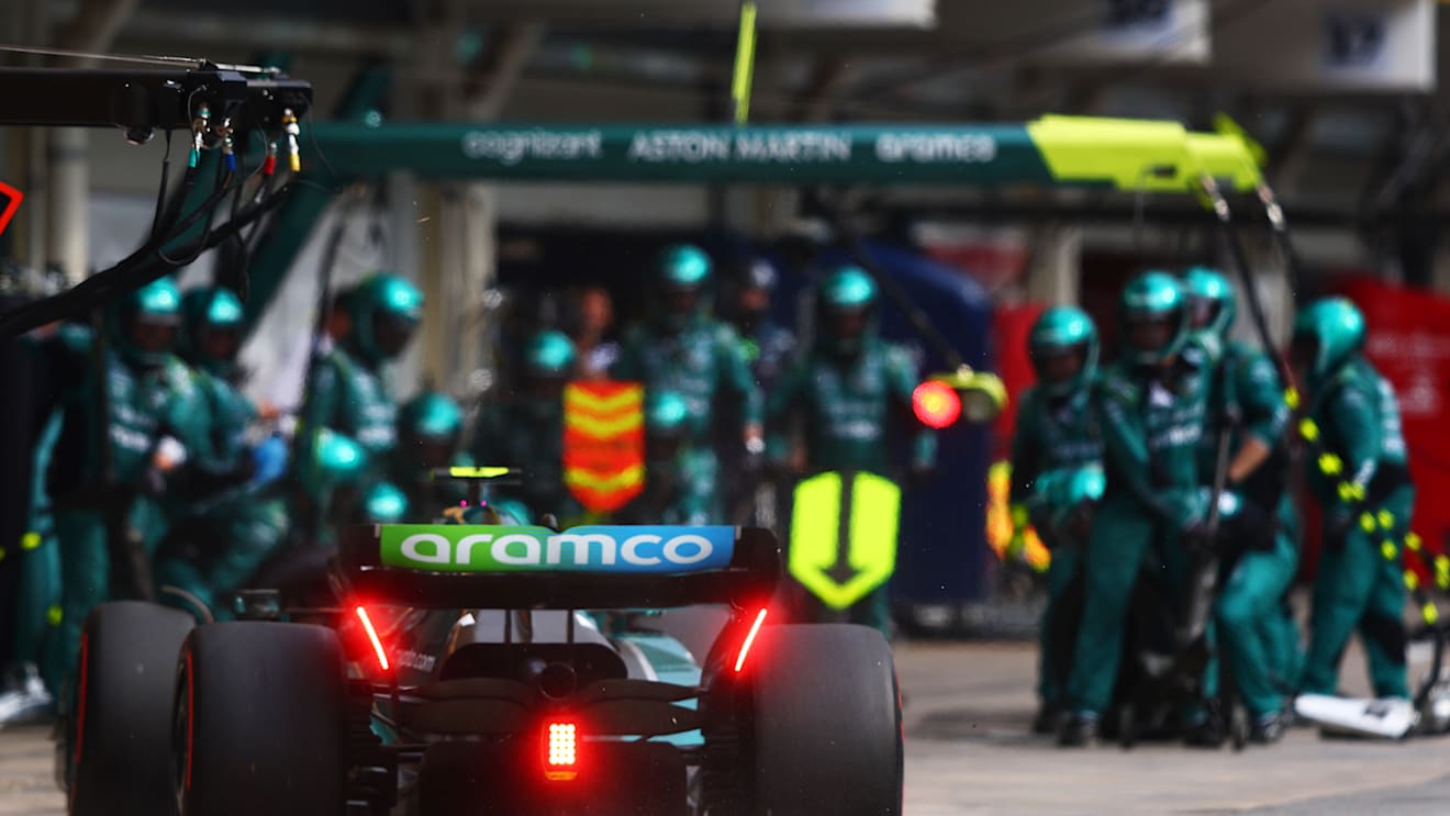 SAO PAULO, BRAZIL - NOVEMBER 13: Sebastian Vettel of Germany driving the (5) Aston Martin AMR22 Mercedes makes a pitstop during the F1 Grand Prix of Brazil at Autodromo Jose Carlos Pace on November 13, 2022 in Sao Paulo, Brazil. (Photo by Mark Thompson/Getty Images)