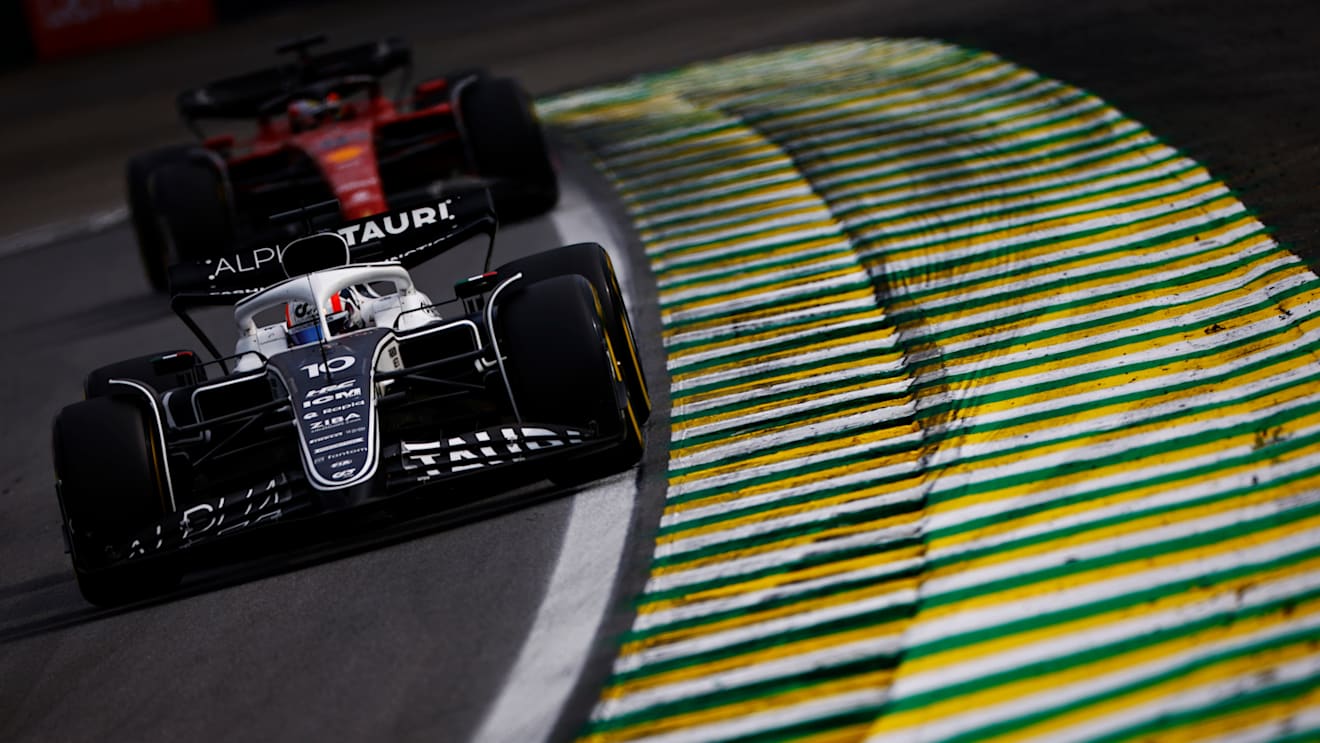 SAO PAULO, BRAZIL - NOVEMBER 13: Pierre Gasly of France driving the (10) Scuderia AlphaTauri AT03 leads Charles Leclerc of Monaco driving the (16) Ferrari F1-75 during the F1 Grand Prix of Brazil at Autodromo Jose Carlos Pace on November 13, 2022 in Sao Paulo, Brazil. (Photo by Jared C. Tilton/Getty Images)