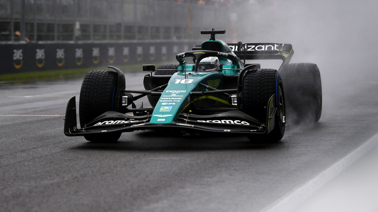 MONTREAL, QUEBEC - JUNE 18: Lance Stroll of Canada driving the (18) Aston Martin AMR22 Mercedes in the wet during qualifying ahead of the F1 Grand Prix of Canada at Circuit Gilles Villeneuve on June 18, 2022 in Montreal, Quebec. (Photo by Dan Mullan/Getty Images)