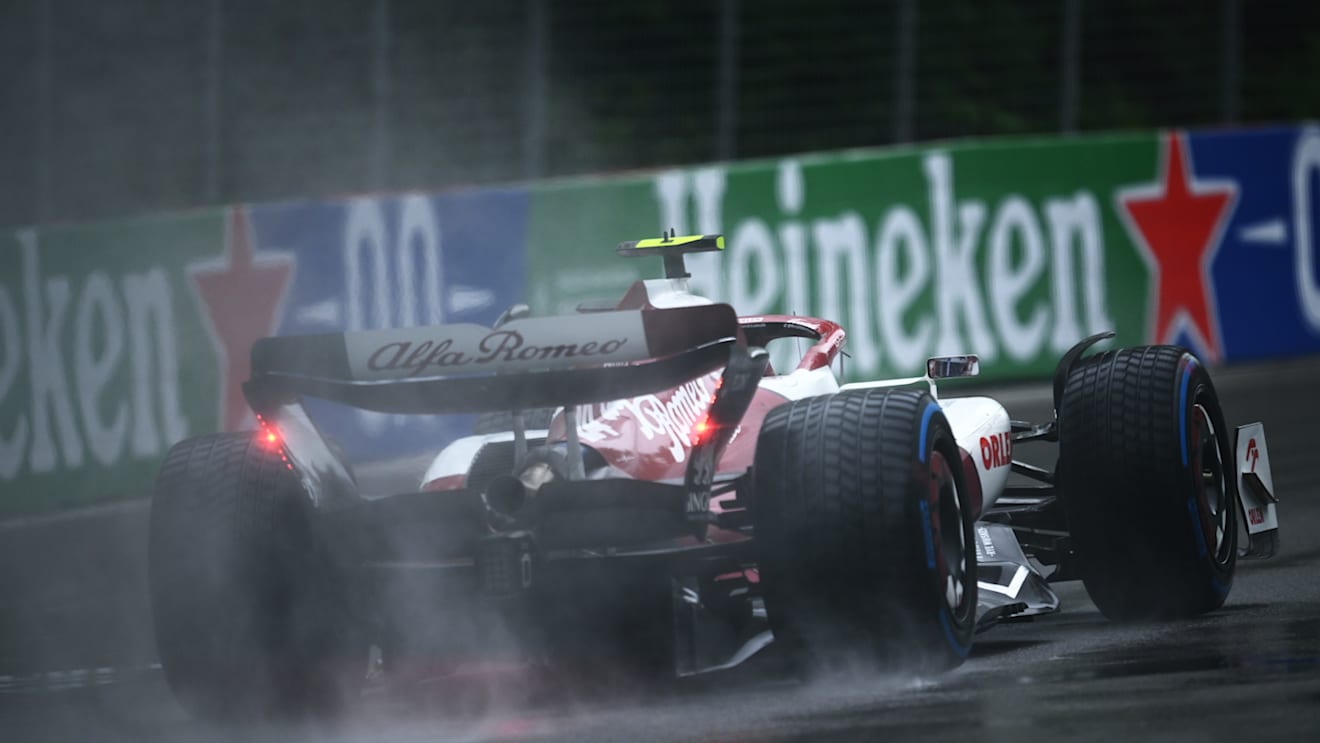 MONTREAL, QUEBEC - JUNE 18: Zhou Guanyu of China driving the (24) Alfa Romeo F1 C42 Ferrari in the wet during qualifying ahead of the F1 Grand Prix of Canada at Circuit Gilles Villeneuve on June 18, 2022 in Montreal, Quebec. (Photo by Clive Mason/Getty Images)