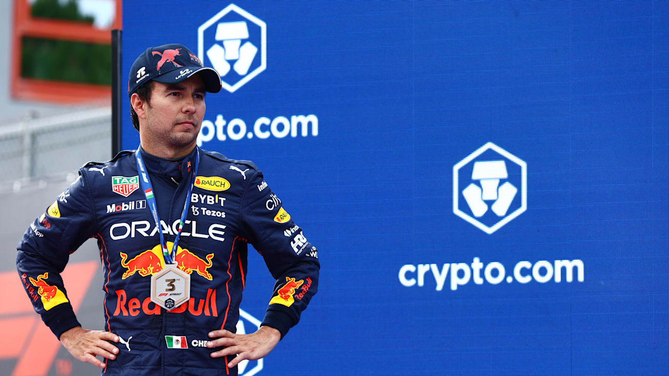 IMOLA, ITALY - APRIL 23: Third placed Sergio Perez of Mexico and Oracle Red Bull Racing looks on at the Sprint Victory Ceremony during Sprint ahead of the F1 Grand Prix of Emilia Romagna at Autodromo Enzo e Dino Ferrari on April 23, 2022 in Imola, Italy. (Photo by Mark Thompson/Getty Images)