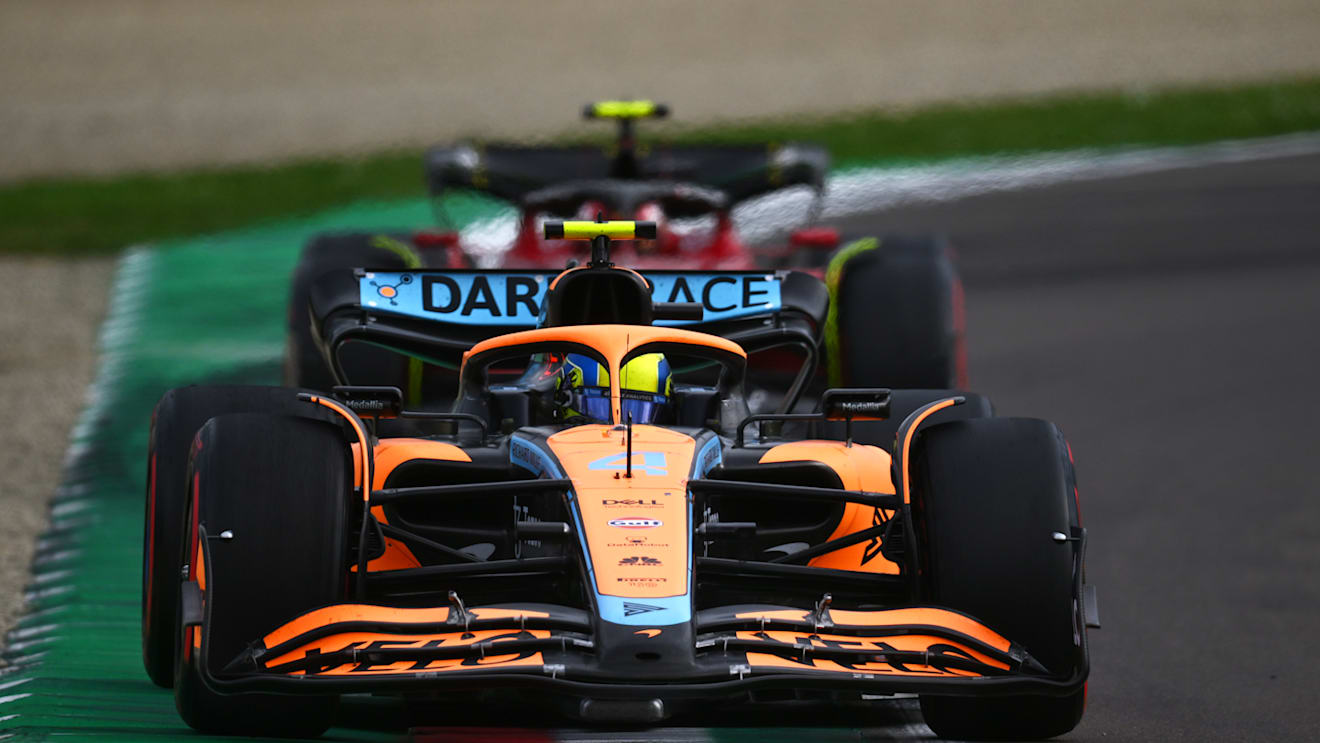 IMOLA, ITALY - APRIL 23: Lando Norris of Great Britain driving the (4) McLaren MCL36 Mercedes leads Carlos Sainz of Spain driving (55) the Ferrari F1-75 during Sprint ahead of the F1 Grand Prix of Emilia Romagna at Autodromo Enzo e Dino Ferrari on April 23, 2022 in Imola, Italy. (Photo by Clive Mason/Getty Images)