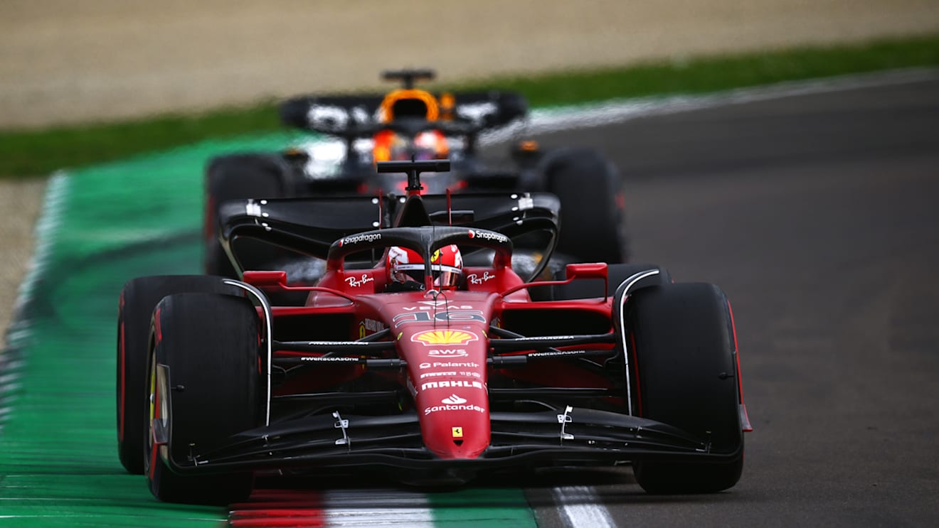 IMOLA, ITALY - APRIL 23: Charles Leclerc of Monaco driving (16) the Ferrari F1-75 leads Max Verstappen of the Netherlands driving the (1) Oracle Red Bull Racing RB18 on track during Sprint ahead of the F1 Grand Prix of Emilia Romagna at Autodromo Enzo e Dino Ferrari on April 23, 2022 in Imola, Italy. (Photo by Clive Mason/Getty Images)