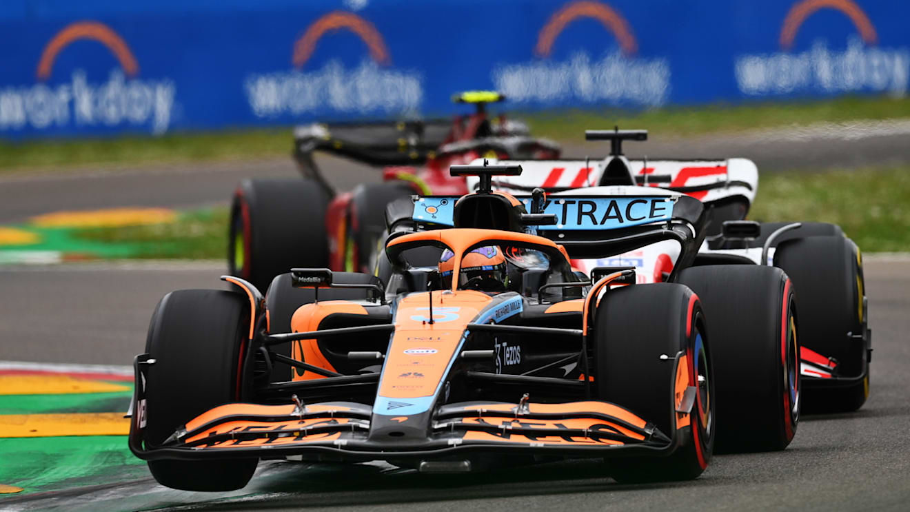 IMOLA, ITALY - APRIL 23: Daniel Ricciardo of Australia driving the (3) McLaren MCL36 Mercedes leads Kevin Magnussen of Denmark driving the (20) Haas F1 VF-22 Ferrari during Sprint ahead of the F1 Grand Prix of Emilia Romagna at Autodromo Enzo e Dino Ferrari on April 23, 2022 in Imola, Italy. (Photo by Dan Mullan/Getty Images)