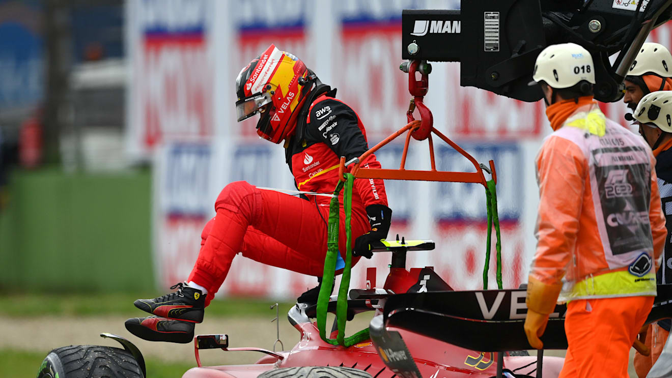 IMOLA, ITALY - APRIL 24: Carlos Sainz of Spain and Ferrari climbs from his car after retiring from the race during the F1 Grand Prix of Emilia Romagna at Autodromo Enzo e Dino Ferrari on April 24, 2022 in Imola, Italy. (Photo by Dan Mullan/Getty Images)