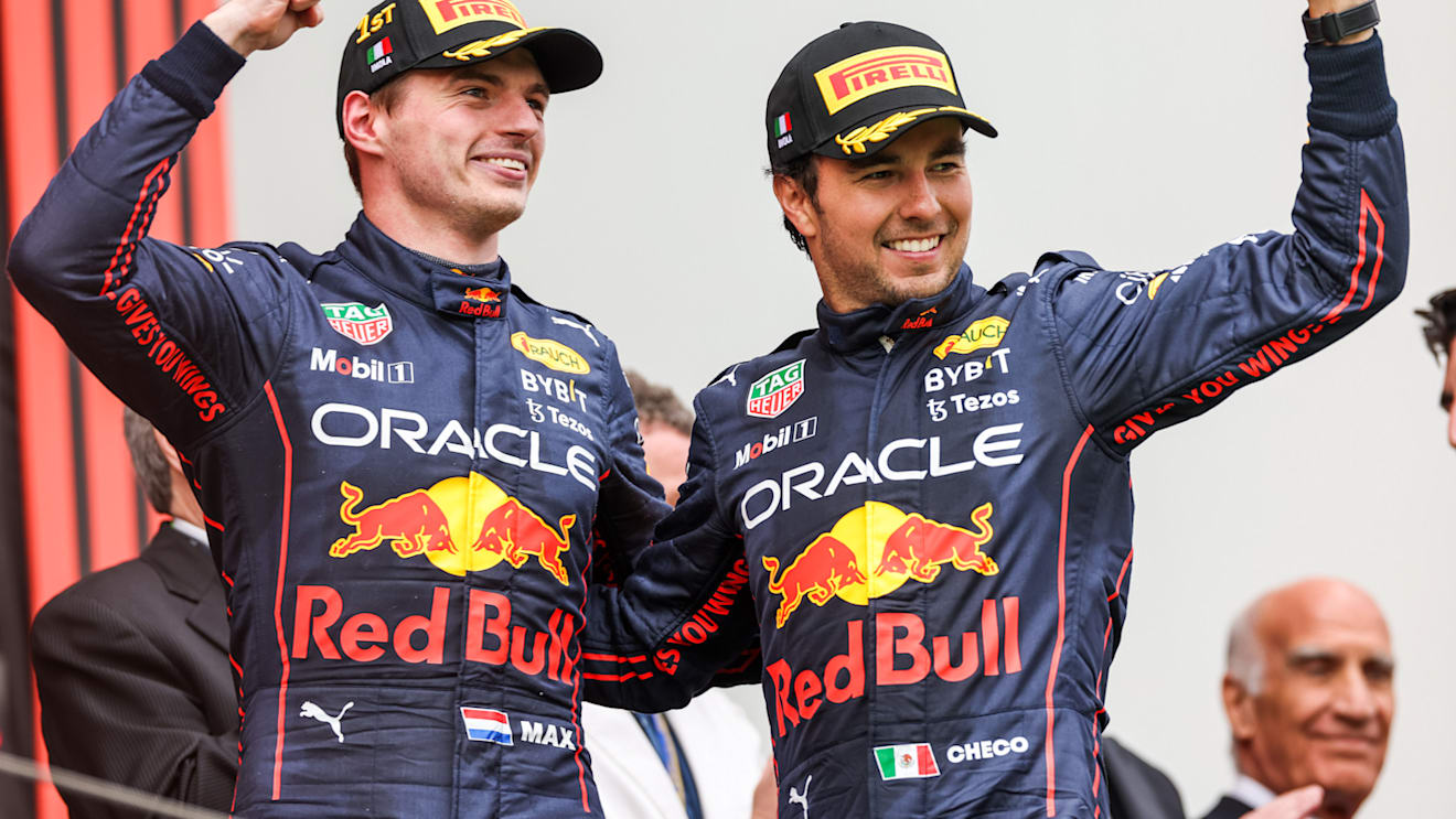 IMOLA, ITALY - APRIL 24: Max Verstappen of Red Bull Racing and The Netherlands  celebrates with Sergio Perez of Mexico and Red Bull Racing after finishing in first and second position during the F1 Grand Prix of Emilia Romagna at Autodromo Enzo e Dino Ferrari on April 24, 2022 in Imola, Italy. (Photo by Peter Fox/Getty Images)