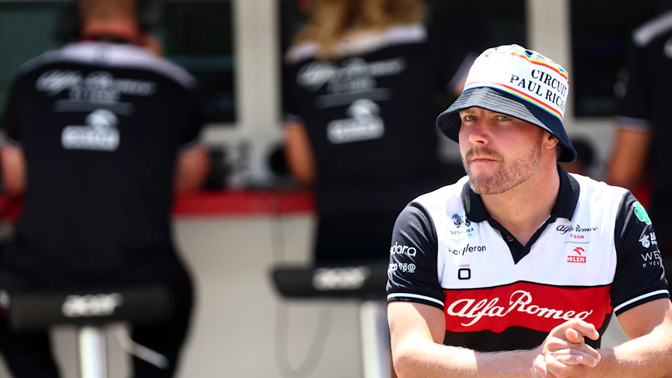 LE CASTELLET, FRANCE - JULY 22: Valtteri Bottas of Finland and Alfa Romeo F1 looks on in the Pitlane as he sits out FP1 during practice ahead of the F1 Grand Prix of France at Circuit Paul Ricard on July 22, 2022 in Le Castellet, France. (Photo by Dan Istitene - Formula 1/Formula 1 via Getty Images)