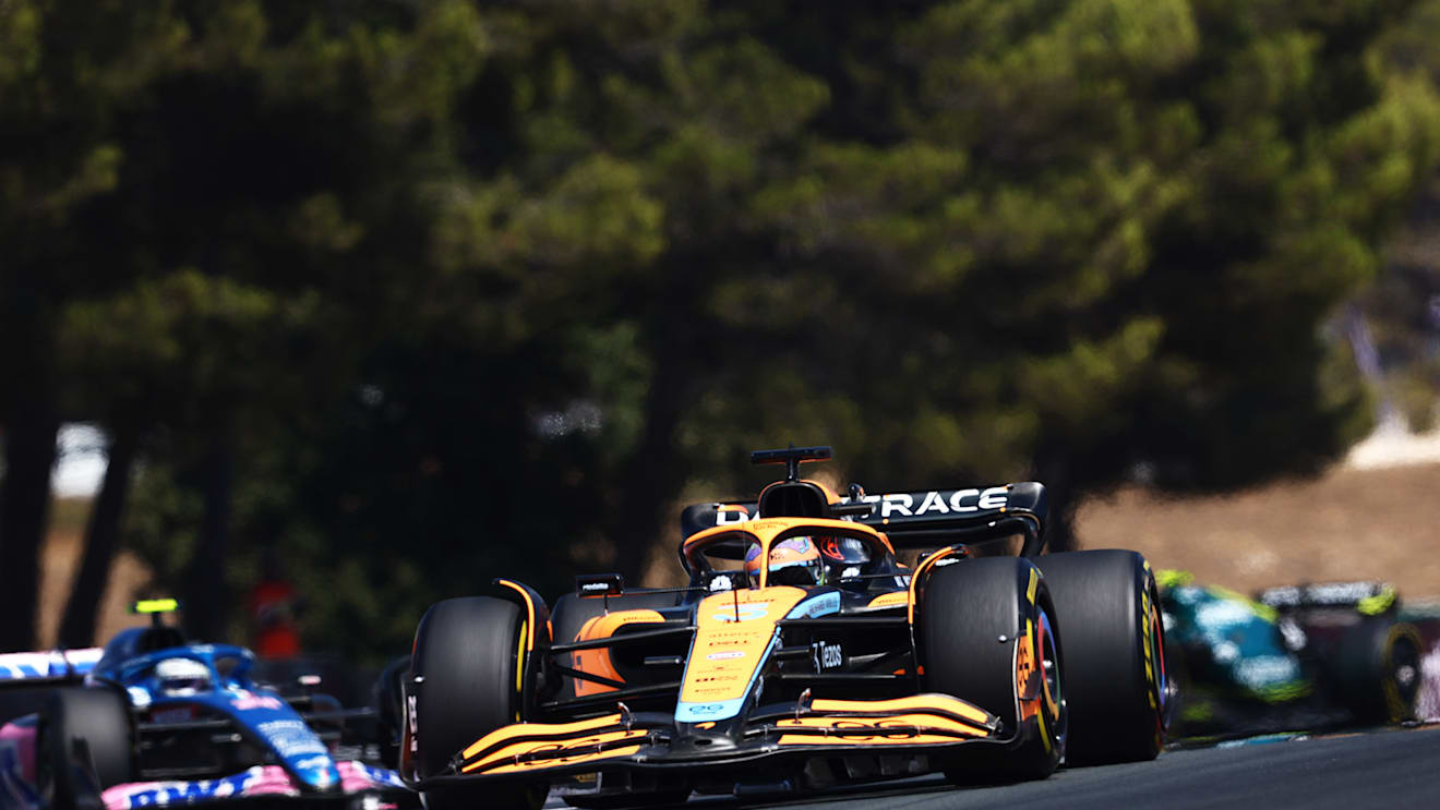 LE CASTELLET, FRANCE - JULY 24: Daniel Ricciardo of Australia driving the (3) McLaren MCL36 Mercedes leads Esteban Ocon of France driving the (31) Alpine F1 A522 Renault on track during the F1 Grand Prix of France at Circuit Paul Ricard on July 24, 2022 in Le Castellet, France. (Photo by Clive Rose/Getty Images)