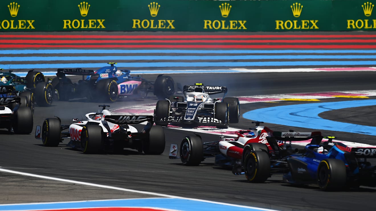 LE CASTELLET, FRANCE - JULY 24: Yuki Tsunoda of Japan driving the (22) Scuderia AlphaTauri AT03 is passed after spinning during the F1 Grand Prix of France at Circuit Paul Ricard on July 24, 2022 in Le Castellet, France. (Photo by Dan Mullan/Getty Images)
