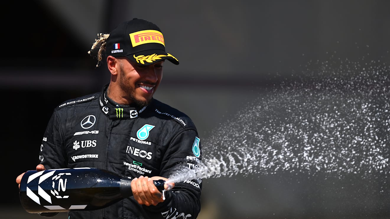 LE CASTELLET, FRANCE - JULY 24: Second placed Lewis Hamilton of Great Britain and Mercedes celebrates on the podium during the F1 Grand Prix of France at Circuit Paul Ricard on July 24, 2022 in Le Castellet, France. (Photo by Dan Mullan/Getty Images)