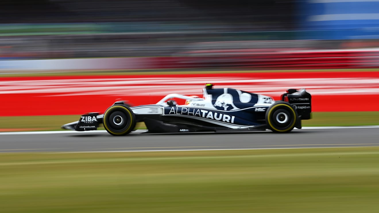 NORTHAMPTON, ENGLAND - JULY 01: Yuki Tsunoda of Japan driving the (22) Scuderia AlphaTauri AT03 during practice ahead of the F1 Grand Prix of Great Britain at Silverstone on July 01, 2022 in Northampton, England. (Photo by Dan Mullan - Formula 1/Formula 1 via Getty Images)