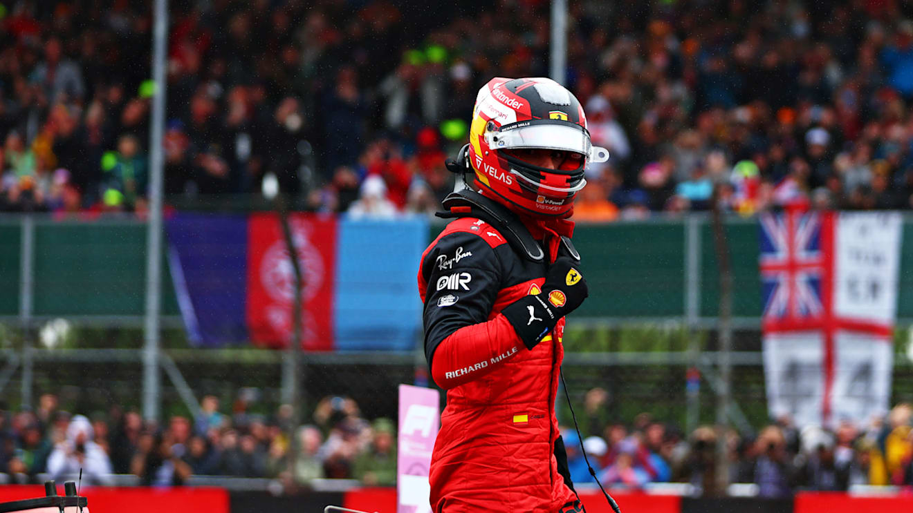 NORTHAMPTON, ENGLAND - JULY 02: Pole position qualifier Carlos Sainz of Spain and Ferrari celebrates in parc ferme during qualifying ahead of the F1 Grand Prix of Great Britain at Silverstone on July 02, 2022 in Northampton, England. (Photo by Mark Thompson/Getty Images)