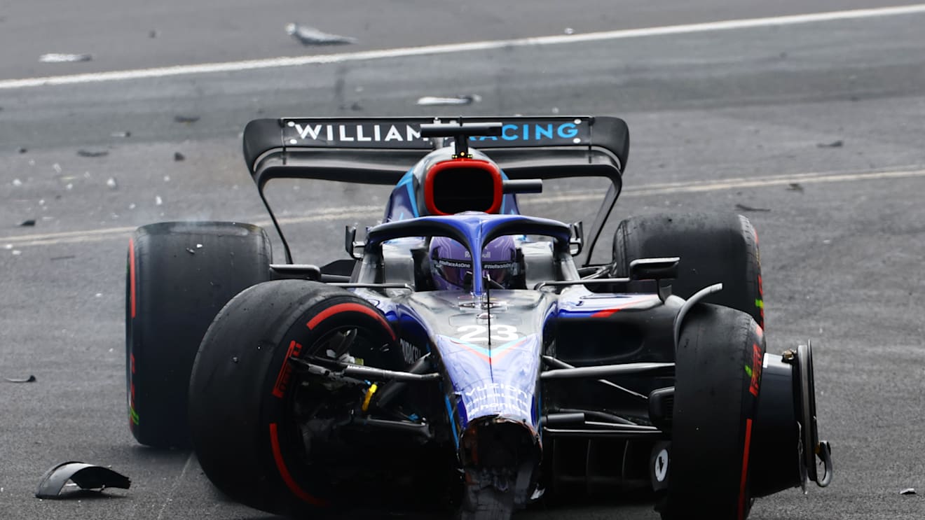 NORTHAMPTON, ENGLAND - JULY 03:  Alexander Albon of Thailand driving the (23) Williams FW44 Mercedes runs off the track after a crash at the start during the F1 Grand Prix of Great Britain at Silverstone on July 03, 2022 in Northampton, England. (Photo by Mark Thompson/Getty Images)