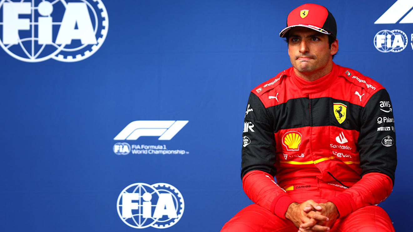 BUDAPEST, HUNGARY - JULY 30: Second placed qualifier Carlos Sainz of Spain and Ferrari looks dejected in parc ferme during qualifying ahead of the F1 Grand Prix of Hungary at Hungaroring on July 30, 2022 in Budapest, Hungary. (Photo by Dan Istitene - Formula 1/Formula 1 via Getty Images)