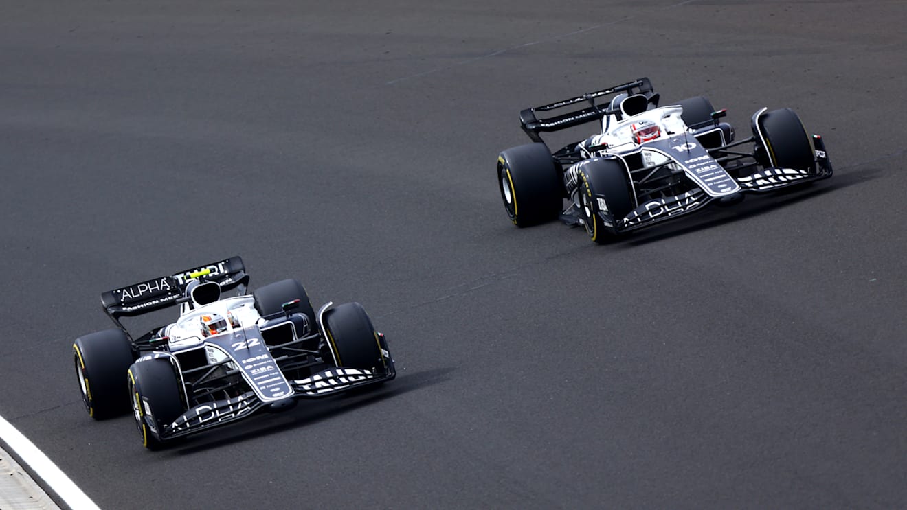 BUDAPEST, HUNGARY - JULY 31: Yuki Tsunoda of Japan driving the (22) Scuderia AlphaTauri AT03 and Pierre Gasly of France driving the (10) Scuderia AlphaTauri AT03 during the F1 Grand Prix of Hungary at Hungaroring on July 31, 2022 in Budapest, Hungary. (Photo by Dan Istitene - Formula 1/Formula 1 via Getty Images)