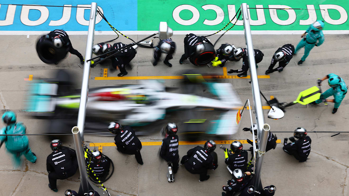 BUDAPEST, HUNGARY - JULY 31: Lewis Hamilton of Great Britain driving the (44) Mercedes AMG Petronas F1 Team W13 makes a pitstop during the F1 Grand Prix of Hungary at Hungaroring on July 31, 2022 in Budapest, Hungary. (Photo by Mark Thompson/Getty Images)