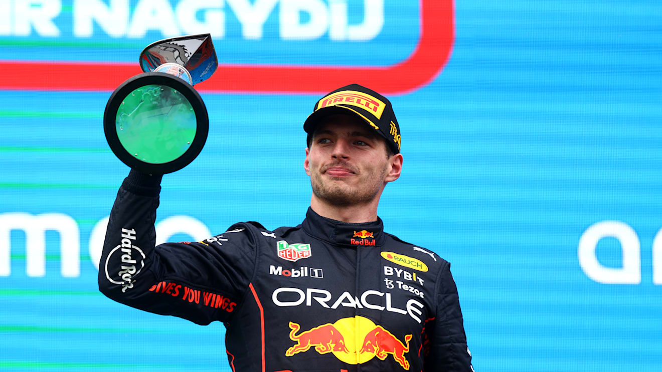 BUDAPEST, HUNGARY - JULY 31: Race winner Max Verstappen of the Netherlands and Oracle Red Bull Racing celebrates on the podium during the F1 Grand Prix of Hungary at Hungaroring on July 31, 2022 in Budapest, Hungary. (Photo by Francois Nel/Getty Images)