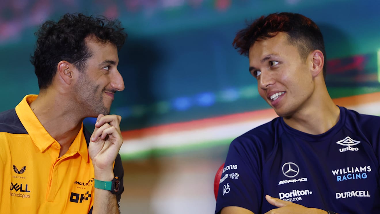 BUDAPEST, HUNGARY - JULY 28: Daniel Ricciardo of Australia and McLaren and Alexander Albon of Thailand and Williams talk in the Drivers Press Conference during previews ahead of the F1 Grand Prix of Hungary at Hungaroring on July 28, 2022 in Budapest, Hungary. (Photo by Bryn Lennon/Getty Images)