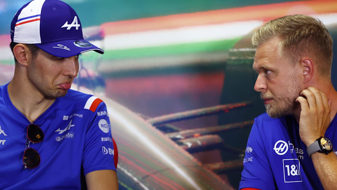 BUDAPEST, HUNGARY - JULY 28: Esteban Ocon of France and Alpine F1 and Kevin Magnussen of Denmark and Haas F1 talk in the Drivers Press Conference during previews ahead of the F1 Grand Prix of Hungary at Hungaroring on July 28, 2022 in Budapest, Hungary. (Photo by Bryn Lennon/Getty Images)