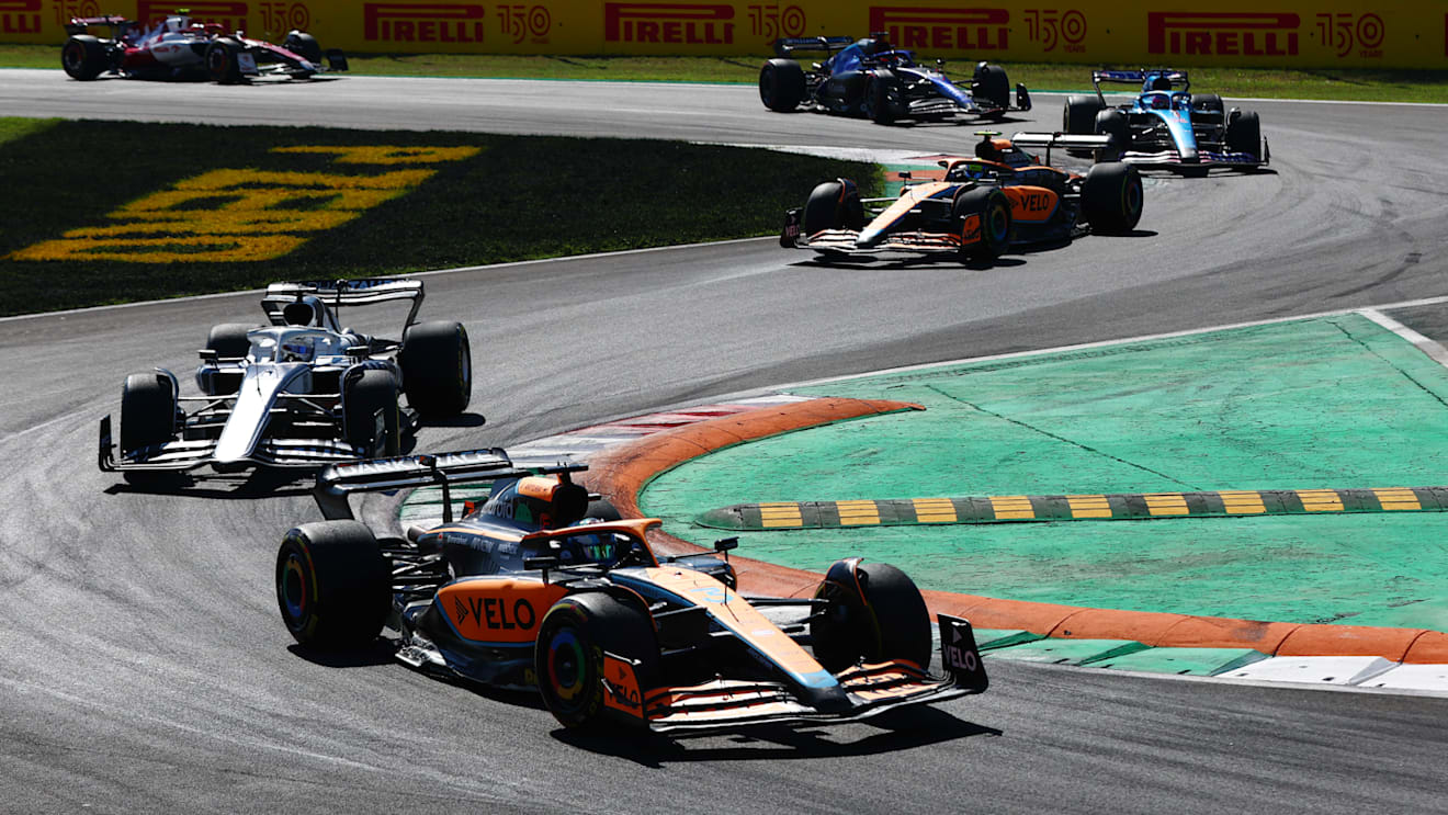 MONZA, ITALY - SEPTEMBER 11: Daniel Ricciardo of Australia driving the (3) McLaren MCL36 Mercedes leads Pierre Gasly of France driving the (10) Scuderia AlphaTauri AT03 during the F1 Grand Prix of Italy at Autodromo Nazionale Monza on September 11, 2022 in Monza, Italy. (Photo by Mark Thompson/Getty Images)