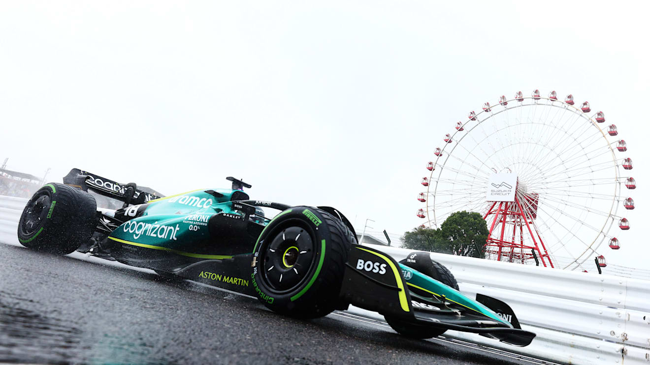 SUZUKA, JAPAN - OCTOBER 07: Lance Stroll of Canada driving the (18) Aston Martin AMR22 Mercedes on track during practice ahead of the F1 Grand Prix of Japan at Suzuka International Racing Course on October 07, 2022 in Suzuka, Japan. (Photo by Clive Rose/Getty Images)