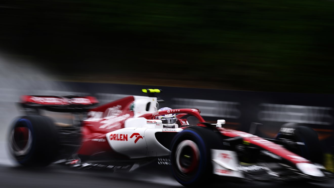 SUZUKA, JAPAN - OCTOBER 07: Zhou Guanyu of China driving the (24) Alfa Romeo F1 C42 Ferrari on track during practice ahead of the F1 Grand Prix of Japan at Suzuka International Racing Course on October 07, 2022 in Suzuka, Japan. (Photo by Clive Mason/Getty Images)