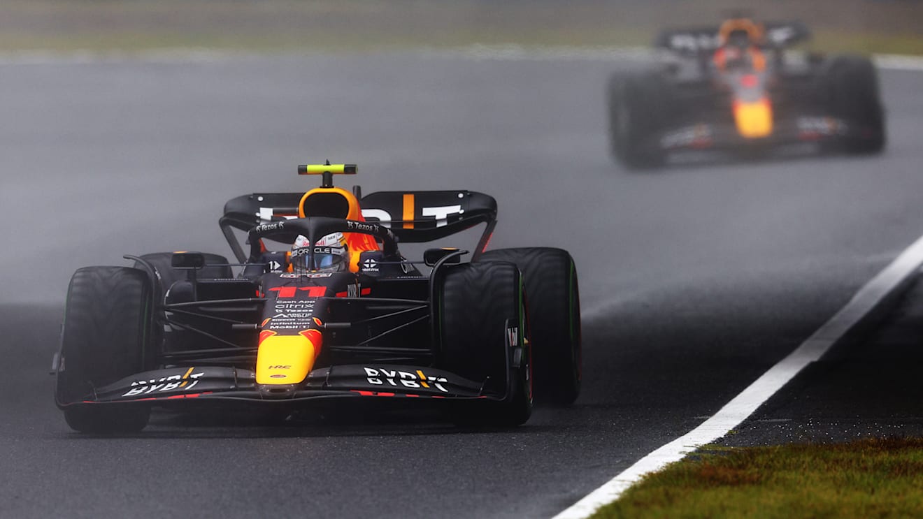 SUZUKA, JAPAN - OCTOBER 07: Sergio Perez of Mexico driving the (11) Oracle Red Bull Racing RB18 leads Max Verstappen of the Netherlands driving the (1) Oracle Red Bull Racing RB18 during practice ahead of the F1 Grand Prix of Japan at Suzuka International Racing Course on October 07, 2022 in Suzuka, Japan. (Photo by Clive Rose/Getty Images)