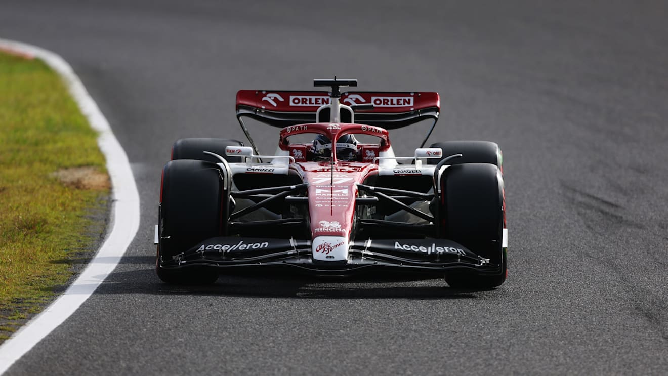 SUZUKA, JAPAN - OCTOBER 08: Valtteri Bottas of Finland driving the (77) Alfa Romeo F1 C42 Ferrari on track during qualifying ahead of the F1 Grand Prix of Japan at Suzuka International Racing Course on October 08, 2022 in Suzuka, Japan. (Photo by Bryn Lennon - Formula 1/Formula 1 via Getty Images)