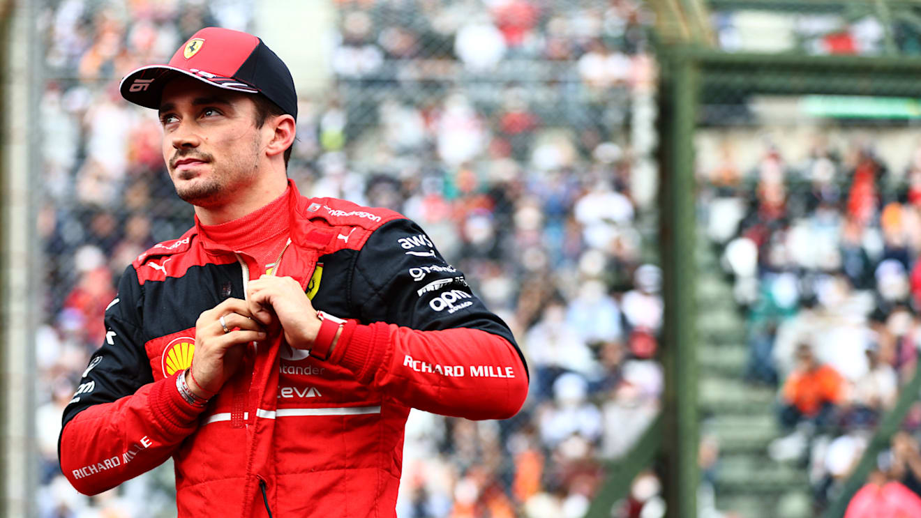 SUZUKA, JAPAN - OCTOBER 08: Second placed qualifier Charles Leclerc of Monaco and Ferrari looks on in parc ferme during qualifying ahead of the F1 Grand Prix of Japan at Suzuka International Racing Course on October 08, 2022 in Suzuka, Japan. (Photo by Mark Thompson/Getty Images )