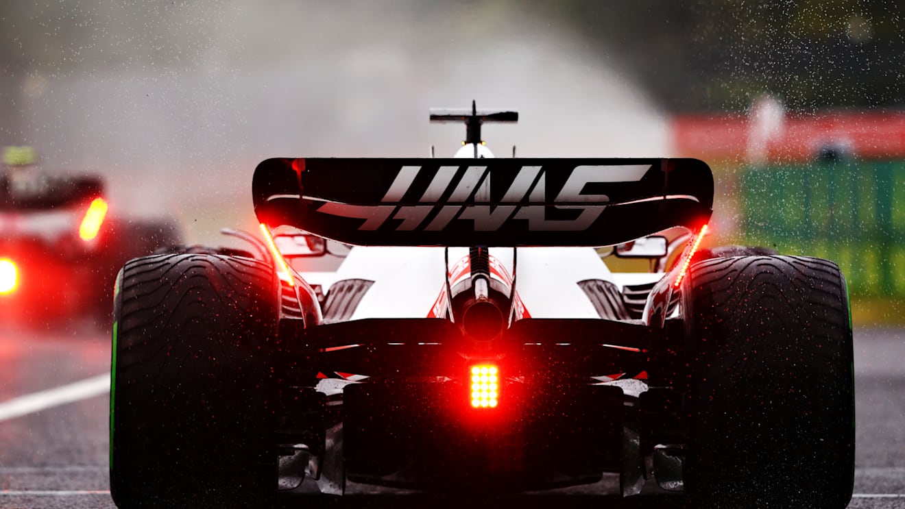 SUZUKA, JAPAN - OCTOBER 09: Kevin Magnussen of Denmark driving the (20) Haas F1 VF-22 Ferrari leaves the pitlane prior to the F1 Grand Prix of Japan at Suzuka International Racing Course on October 09, 2022 in Suzuka, Japan. (Photo by Mark Thompson/Getty Images )